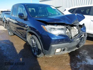 2020 Honda Ridgeline RTL with VIN 5FPYK3F56LB020705, listed as a IAAI auction lot 41219665 with 68,870 mi miles and . Bid and sale history available at DreamBid. Image 1.