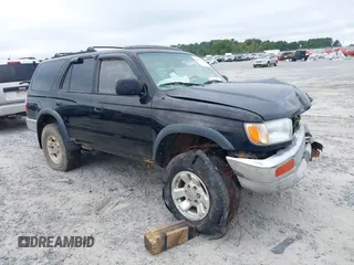 1996 Toyota 4Runner SR5 z VIN JT3HN86R9T0052390, wystawiony jako IAAI lot #40195401 z przebiegiem 254 192 mil mil oraz . Historia ofert i sprzedaży dostępna na DreamBid. Obrazek 1.