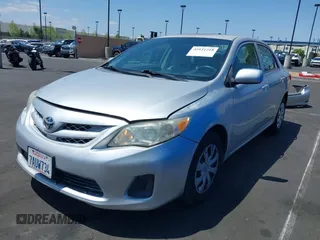 2013 Toyota Corolla L with VIN 5YFBU4EE3DP207633, listed as a IAAI auction lot 42131218 with 89,899 mi miles and . Bid and sale history available at DreamBid. Image 18.