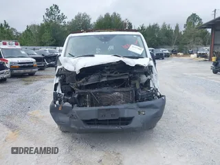 2016 Ford Transit Cargo z VIN 1FTYE1YMXGKB48964, wystawiony jako IAAI lot #41227860 z przebiegiem Nie podano mil oraz . Historia ofert i sprzedaży dostępna na DreamBid. Obrazek 13.