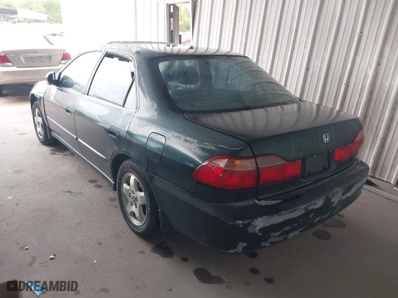 1999 Honda Accord Sdn EX with VIN 1HGCG165XXA046541, listed as a IAAI auction lot 41823805 with 266131 miles. Bid and sale history available at carsss.com. Image 3.
