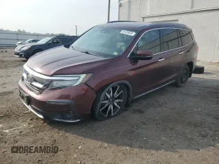 2020 Honda Pilot Touring 8-Passenger z VIN 5FNYF6H96LB028737, wystawiony jako Copart lot #60435635 z przebiegiem 115 023 mil mil oraz Szkoda całkowita • Salvage title. Historia ofert i sprzedaży dostępna na DreamBid. Obrazek 1.