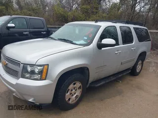2014 Chevrolet Suburban LS with VIN 1GNSCHE08ER217393, listed as a IAAI auction lot 41563635 with 212,852 mi miles. Bid and sale history available at carsss.com. Image 2.