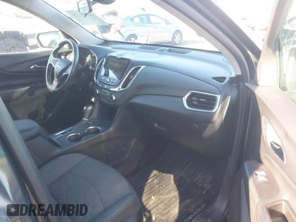 2018 Chevrolet Equinox LT z VIN 2GNAXSEV2J6122861, wystawiony jako IAAI lot #41741471 z przebiegiem 121 123 mil mil oraz . Historia ofert i sprzedaży dostępna na DreamBid. Obrazek 5.