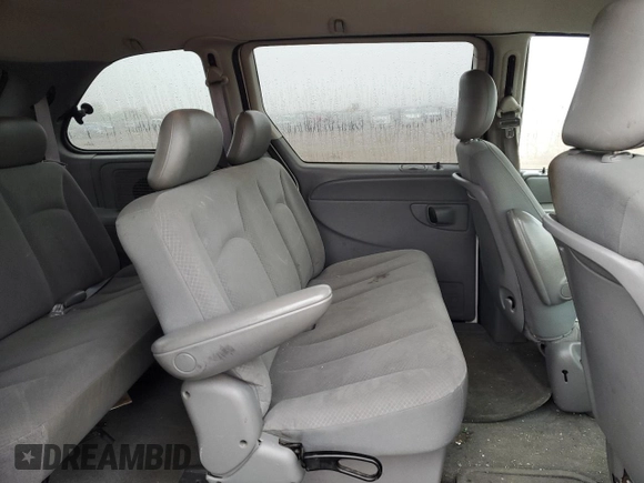 2007 Dodge Caravan SE z VIN 1D4GP25E57B258607, wystawiony jako Copart lot #54958755 z przebiegiem 183 488 mil mil oraz Szkoda całkowita • Salvage title. Historia ofert i sprzedaży dostępna na DreamBid. Obrazek 11.