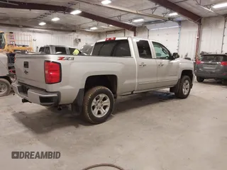 2019 Chevrolet Silverado 1500 LT with VIN 2GCVKPEC1K1212411, listed as a IAAI auction lot 41060633 with 75,508 mi miles and . Bid and sale history available at DreamBid. Image 4.