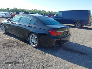 2015 BMW 7 Series 750Li with VIN WBAYE8C50FD781384, listed as a IAAI auction lot 42049829 with 128,087 mi miles and . Bid and sale history available at carsss.com. Image 3.