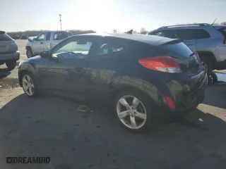 2015 Hyundai Veloster with VIN KMHTC6AD0FU229154, listed as a Copart auction lot 49070635 with 135,790 mi miles and Salvage Title. Bid and sale history available at carsss.com. Image 2.