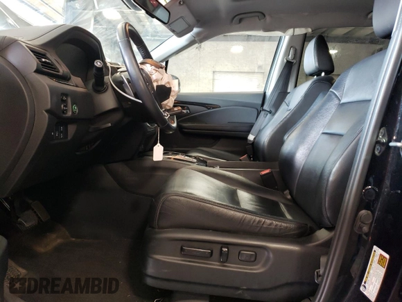 2017 Honda Pilot Touring with VIN 5FNYF6H97HB036935, listed as a Copart auction lot 71757334 with 68,641 mi miles and Salvage Title. Bid and sale history available at DreamBid. Image 7.