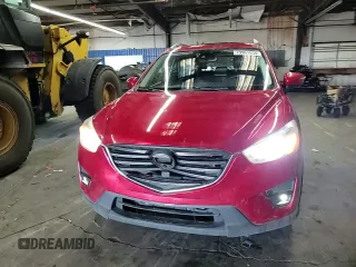 2016 Mazda CX-5 Grand Touring with VIN JM3KE4DY1G0669316, listed as a Copart auction lot 79961554 with 117,454 mi miles and Salvage Title. Bid and sale history available at carsss.com. Image 12.