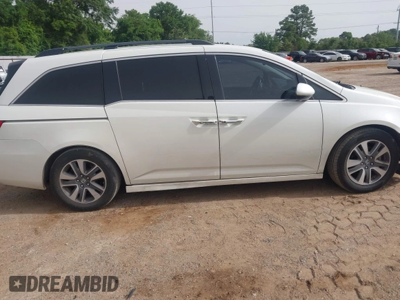 2015 Honda Odyssey Touring Elite with VIN 5FNRL5H96FB045968, listed as a IAAI auction lot 42263637 with 207,637 mi miles and . Bid and sale history available at DreamBid. Image 13.