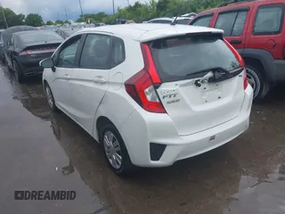 2015 Honda Fit LX with VIN 3HGGK5H52FM775462, listed as a IAAI auction lot 42549634 with 167,391 mi miles and . Bid and sale history available at DreamBid. Image 3.