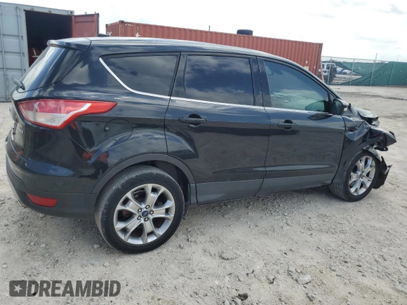 2013 Ford Escape SEL with VIN 1FMCU9H99DUD79003, listed as a Copart auction lot 51126005 with 104,151 mi miles and Clean Title. Bid and sale history available at DreamBid. Image 3.