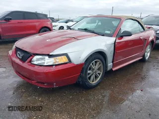 2004 Ford Mustang Deluxe with VIN 1FAFP44624F197158, listed as a IAAI auction lot 41712280 with 136,762 mi miles. Bid and sale history available at carsss.com. Image 2.