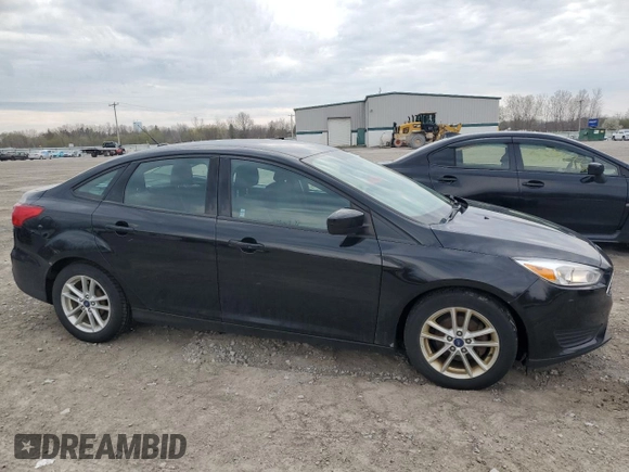 2018 Ford Focus SE with VIN 1FADP3F27JL301121, listed as a Copart auction lot 54596815 with 144,015 mi miles and Clean Title. Bid and sale history available at carsss.com. Image 4.