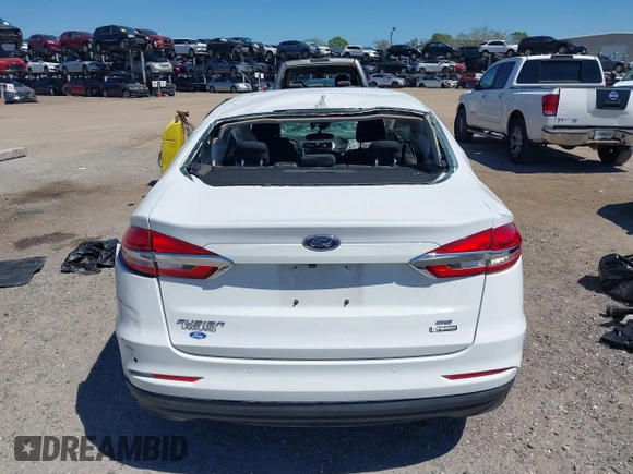 2020 Ford Fusion SE z VIN 3FA6P0LU8LR266686, wystawiony jako IAAI lot #41790126 z przebiegiem 95 314 mil mil oraz . Historia ofert i sprzedaży dostępna na DreamBid. Obrazek 16.