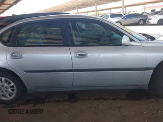 2002 Chevrolet Impala z VIN 2G1WF55E729342685, wystawiony jako IAAI lot #42398091 z przebiegiem 159 311 mil mil oraz . Historia ofert i sprzedaży dostępna na DreamBid. Obrazek 13.