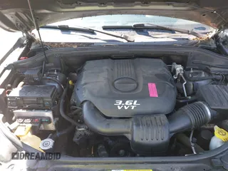 2012 Jeep Grand Cherokee Limited with VIN 1C4RJEBG1CC258123, listed as a IAAI auction lot 42065345 with 168,852 mi miles. Bid and sale history available at carsss.com. Image 10.