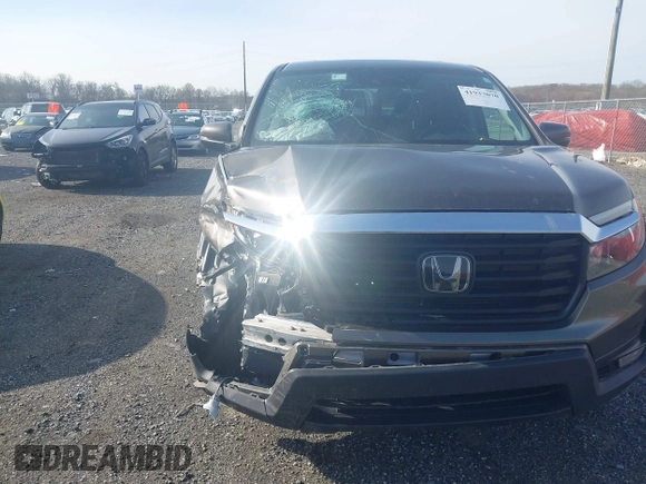2022 Honda Ridgeline RTL z VIN 5FPYK3F51NB038239, wystawiony jako IAAI lot #41937070 z przebiegiem 39 012 mil mil oraz . Historia ofert i sprzedaży dostępna na DreamBid. Obrazek 6.