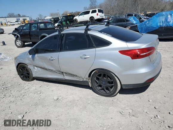 2016 Ford Focus SE with VIN 1FADP3F24GL267194, listed as a Copart auction lot 48812385 with 154,466 mi miles and Salvage Title. Bid and sale history available at carsss.com. Image 2.