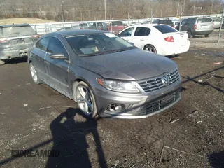2013 Volkswagen CC Sport with VIN WVWBN7AN1DE563404, listed as a IAAI auction lot 41659845 with 171,631 mi miles and . Bid and sale history available at DreamBid. Image 1.