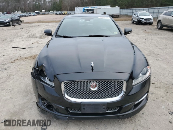 2015 Jaguar XJ with VIN SAJWA1CZ1F8V85402, listed as a Copart auction lot 86717734 with 201,249 mi miles and Salvage Title. Bid and sale history available at carsss.com. Image 5.