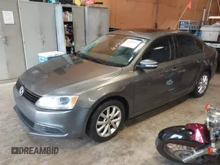 2011 Volkswagen Jetta Sedan SE PZEV with VIN 3VWDZ7AJ9BM369301, listed as a IAAI auction lot 41982641 with 114,217 mi miles. Bid and sale history available at carsss.com. Image 2.