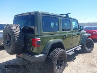 2020 Jeep Wrangler Unlimited Sahara High Altitude with VIN 1C4HJXEG8LW283103, listed as a IAAI auction lot 41830769 with 39,447 mi miles and . Bid and sale history available at DreamBid. Image 4.