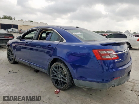 2014 Ford Taurus Limited with VIN 1FAHP2F86EG100650, listed as a Copart auction lot 57033215 with 79,985 mi miles and Salvage title. Bid and sale history available at DreamBid. Image 2.