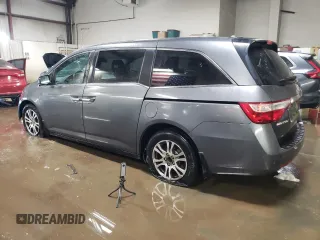 2012 Honda Odyssey EX-L with VIN 5FNRL5H69CB143572, listed as a Copart auction lot 48614255 with 114,490 mi miles and Salvage Title. Bid and sale history available at carsss.com. Image 2.