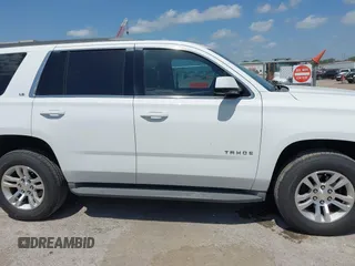 2015 Chevrolet Tahoe LS z VIN 1GNSCAKC6FR239156, wystawiony jako IAAI lot #42545513 z przebiegiem 117 863 mil mil oraz . Historia ofert i sprzedaży dostępna na DreamBid. Obrazek 13.