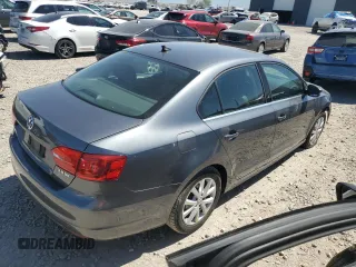 2013 Volkswagen Jetta SE with VIN 3VWDX7AJ3DM271048, listed as a Copart auction lot 59257995 with 122,393 mi miles and Salvage title. Bid and sale history available at DreamBid. Image 3.
