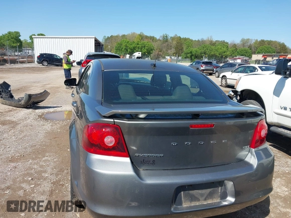 2013 Dodge Avenger SXT with VIN 1C3CDZCG7DN585431, listed as a IAAI auction lot 41975228 with 152,703 mi miles and . Bid and sale history available at carsss.com. Image 16.