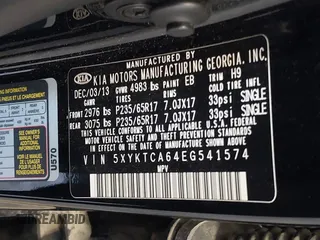 2014 Kia Sorento LX with VIN 5XYKTCA64EG541574, listed as a IAAI auction lot 42067910 with 144,234 mi miles and . Bid and sale history available at carsss.com. Image 9.