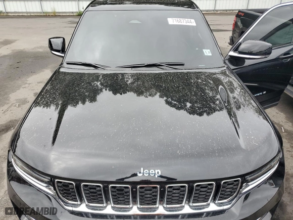 2023 Jeep Grand Cherokee 4xe with VIN 1C4RJYB62P8774637, listed as a Copart auction lot 71687344 with NaN miles and Salvage Title. Bid and sale history available at carsss.com. Image 12.