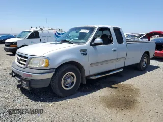 2001 Ford F-150 XL z VIN 1FTRX17W11NA24623, wystawiony jako Copart lot #56767345 z przebiegiem 201 959 mil mil oraz Szkoda całkowita • Salvage title. Historia ofert i sprzedaży dostępna na DreamBid. Obrazek 1.
