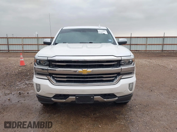 2018 Chevrolet Silverado 1500 High Country with VIN 3GCUKTEC1JG331991, listed as a IAAI auction lot 41718084 with 120,924 mi miles and . Bid and sale history available at DreamBid. Image 12.