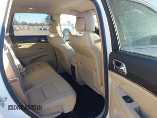 2014 Jeep Grand Cherokee Limited with VIN 1C4RJEBG9EC414265, listed as a IAAI auction lot 41843360 with 118,767 mi miles and . Bid and sale history available at DreamBid. Image 8.