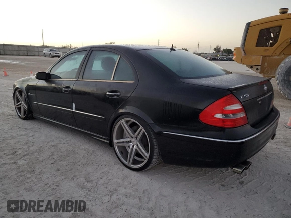 2005 Mercedes-Benz E-Class 5.5L AMG with VIN WDBUF76J05A675937, listed as a Copart auction lot 77349524 with 0 mi miles and Salvage Title. Bid and sale history available at carsss.com. Image 2.