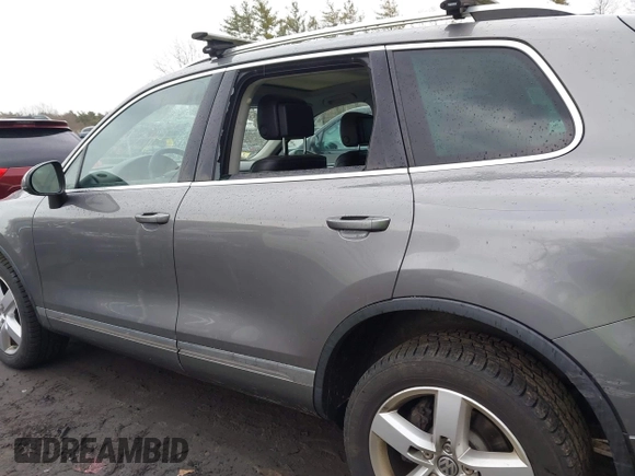 2013 Volkswagen Touareg Lux with VIN WVGEF9BP0DD005082, listed as a IAAI auction lot 41667026 with 140,148 mi miles and . Bid and sale history available at DreamBid. Image 15.