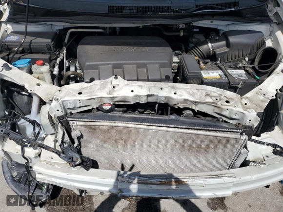 2017 Honda Odyssey Touring z VIN 5FNRL5H99HB007993, wystawiony jako Copart lot #60501805 z przebiegiem 104 628 mil mil oraz Szkoda całkowita • Salvage title. Historia ofert i sprzedaży dostępna na DreamBid. Obrazek 12.