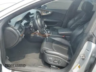 2015 Audi RS 7 с VIN WAUW2CFC5FN013049, выставлен на аукционе Copart как лот 57957093 с пробегом 95 826 миль миль и . История ставок и продаж доступна на DreamBid. Изображение 7.