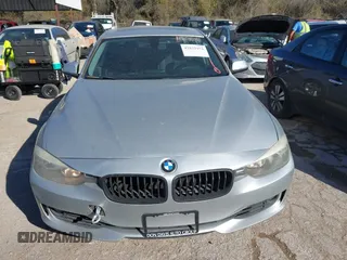 2012 BMW 3 Series 328i with VIN WBA3A5C5XCF345274, listed as a IAAI auction lot 41812072 with 142,024 mi miles. Bid and sale history available at carsss.com. Image 6.