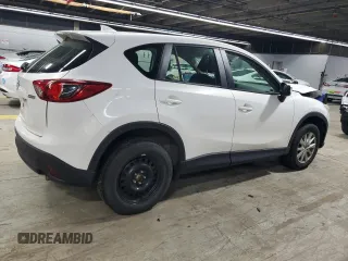 2016 Mazda CX-5 Sport with VIN JM3KE4BY9G0694709, listed as a Copart auction lot 55147555 with 98,900 mi miles and Salvage title. Bid and sale history available at DreamBid. Image 3.