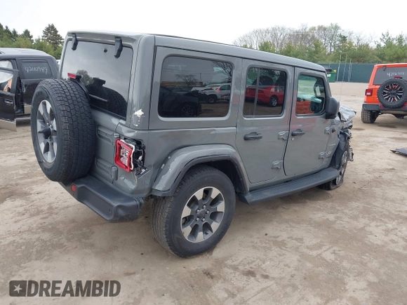 2022 Jeep Wrangler Unlimited Sahara with VIN 1C4HJXEG7NW138105, listed as a IAAI auction lot 42146898 with Not provided miles and . Bid and sale history available at DreamBid. Image 4.