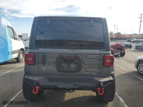 2019 Jeep Wrangler Unlimited Rubicon with VIN 1C4HJXFG7KW604349, listed as a Copart auction lot 43225165 with 35,938 mi miles and Salvage Title. Bid and sale history available at carsss.com. Image 6.