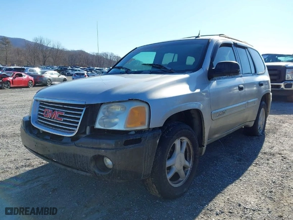 2004 GMC Envoy SLE with VIN 1GKDT13S842134524, listed as a IAAI auction lot 41610041 with 217,166 mi miles. Bid and sale history available at carsss.com. Image 6.