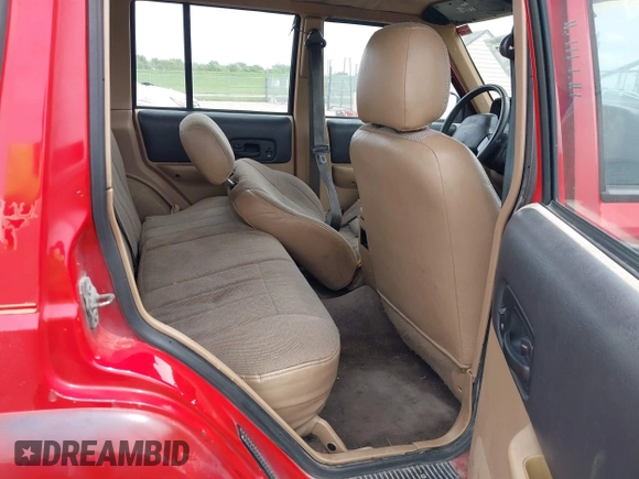 1999 Jeep Cherokee Sport with VIN 1J4FT68S6XL511158, listed as a IAAI auction lot 42170917 with 251,442 mi miles and . Bid and sale history available at DreamBid. Image 8.