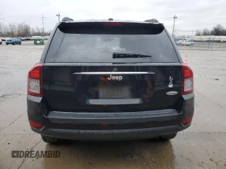 2016 Jeep Compass Latitude with VIN 1C4NJCEB7GD664653, listed as a Copart auction lot 87313664 with 64,580 mi miles and Salvage Title. Bid and sale history available at carsss.com. Image 6.