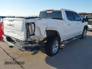 2021 GMC Sierra 1500 SLT z VIN 3GTU9DED5MG123692, wystawiony jako IAAI lot #41229854 z przebiegiem 84 651 mil mil oraz . Historia ofert i sprzedaży dostępna na DreamBid. Obrazek 4.